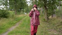 Miss Petra takes a walk in an AGU rain suit and rubber boots