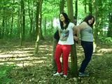Two girls cuffed to a tree 1/2