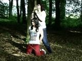Two girls cuffed to a tree 2/2
