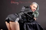 Mara wearing a sexy black shiny nylon shorts and a black rain jacket posing for you (Pics)