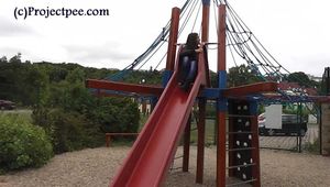 078090 Rachel Evans Takes A Very Naughty Pee In the Play Park