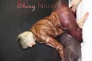 Watching ***SONJA*** wearing a sexy brown shiny nylon rainwear combination preparing her bed an lolling in the bed (Pics)