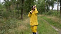 Miss Petra goes for a walk in friesennerz, yellow rain dungarees and rubber boots