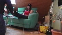 Lisa roped on couch 1/2