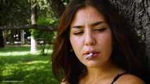 Good smoker Elmira is chain smoking all white 120mm cigarettes