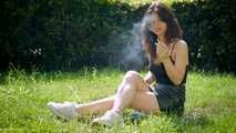 Arina is smoking 120mm cigarettes outdoors