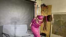 Marie M tied and gagged in a PVC suit