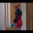 Sonja cleaning up the corridor wearing a very hot red shiny nylon shorts and an oldschool red/blue rain jacket (Video)