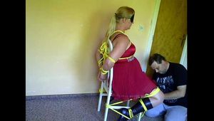 Chairtied with yellow ropes - another view