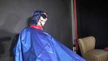 Watzching sexy PIA wearing a sexy oldschool rainwear combination in red/blue sitting on a hairdresser´s chair being tied and gagged from Sophie (Video)