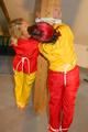 Archive girl tied, gagged and hooded by Jill both wearing sexy yellow/red Rainwear (Pics)