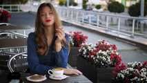 Gorgeous lady Irina having a cookie, coffee and a 120mm cigarette for lunch
