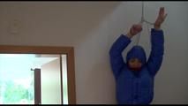 Jill tied, gagged and hooded in a stairway with cuffs wearing a sexy blue PAMY jacket and a rain pants (Video)