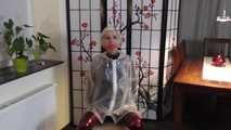 Miss Francine is bound and gagged in her nice tight PVC pants covered with a transparent raincoat