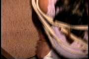 27 Yr OLD BEAUTY SALON OWNER IS TIED TO A CHAIR, MOUTH STUFFED, CLEAVE GAGGED, BAREFOOT, TOE-TIED, GAG TALKING AND HANDGAGGED (D74-3)