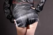 Mara wearing a sexy black shiny nylon shorts and a black rain jacket posing for you (Pics)