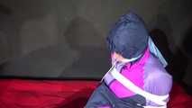 Have a look on sexy Pia wearing a supersexy blue/purple/pink rainwear combination being tied and gagged with ropes and a cloth gag (Video)