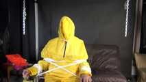 Sandra being tied and gagged on a hairdresser´s chair wearing sexy yellow shiny nylon rainwear being double hooded (Video)