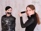 [From archive] Marvita is wrapped in black cling film by Chantelle