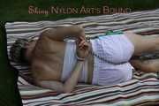 Watching Sonja wearing a hot white shiny nylon shorts and a white top bound herself and gag herself in the garden (Pics)