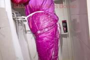 Sonja tied and gagged in an shower cabine wearing a supersexy oldschool pink shiny downwear suit (Pics)