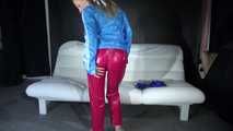 Watching sexy Sandra dressing her up with a new red shiny nylon rain pants and a blue rain jacket lolling, posing and enjoying herself in this cloth (Video)