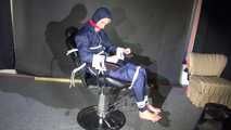 Watching Sonja sitting on a hairdresser`s chair wearing sexy blue shiny nylon rainwear with a raincape being tied, gagged and hooded with ropes and a clothgag (Video)