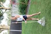 Watching sexy Sandra wearing a oldschool blue shiny shorts and a top while gardening outside (Video)