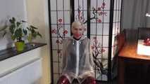 Miss Francine is bound and gagged in her nice tight PVC pants covered with a transparent raincoat