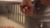 Prisoner in handcuffs and legirons