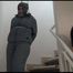 Jill tied, gagged and hooded in an stairway wearing a sexy shiny grey downwear (Video)