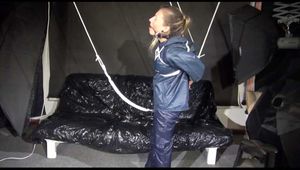 ***SPECIAL*** SEXY SANDRA tied and gagged overhead with special crotchrope wearing a sexy blue really shiny nylon rain pants and an oldschool shiny nylon rain jacket (Video)