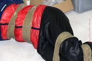 Simone tied and gagged in shiny nylon rainwear