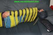 Get 328 Pictures with Katharina tied and gagged in shiny nylon rainwear from 2005-2008!