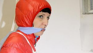 Mara tied, gagged and hooded in a cellar wearing sexy shiny nylon down pants and down jacket (Pics)