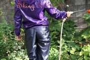 Watching sexy Sandra watering the flowers in the garden and lolling in the sun wearing a sexy blue shiny nylon rain pant and a purple down jacket (Pics)