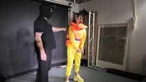 Marie M in a customer wish video handcuffed in Rainwear and a lifevest.