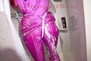 Sonja tied and gagged in an shower cabine wearing a supersexy oldschool pink shiny downwear suit (Pics)