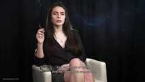 Alla is giving an interview while smoking her favorite cigarettes