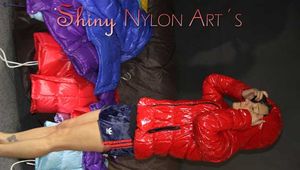 Watching sexy Stella and Sandra wearing a sexy shiny nylon shorts putting on several chiny nylon down jackets (Pics)