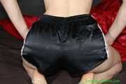 Watch Sonja enjoying her shiny nylon Shorts