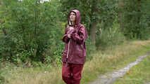 Miss Petra takes a walk in an AGU rain suit and rubber boots