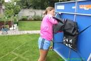 Watch Sandra preparing for Tabletennis in her shiny nylon Shorts