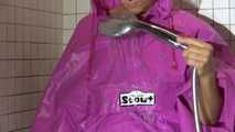 Watching Sandra wearing only a pink shiny nylon raincape under the shower playing with the water (Video)