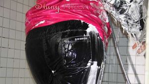 Watching Mara taking a shower and foaming herself with sexy shiny nylon rainwear (Pics)