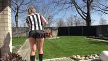 Watching Pia sweeping the terrace wearing a sexy black shiny nylon shorts, a striped top and black rubber boots (Video)