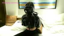 Xiaoyu Hooded, Bagged and Wearing Gas Mask