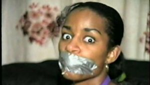 BLACK STUDENT TIED, GAGGED & HOG-TIED WITH DUCT TAPE (D28-3)