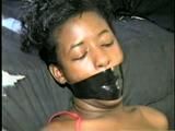 BLACK SHONDA IS WRAP TAPE GAGGED & BOUND UP WITH BLACK ELECTRICAL TAPE (D33-10)