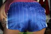 Watch Pia enjoying her blue shiny nylon Shorts
